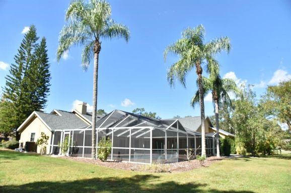 5908 HAMMOCK WOODS DRIVE