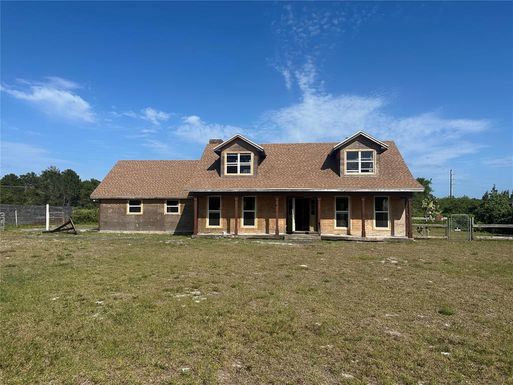 6565 WHISPERING PINE LANE