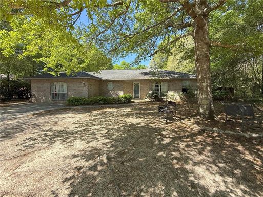 7748 RUSTLING PINES DRIVE