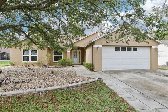 10304 RAINBOW OAKS DRIVE