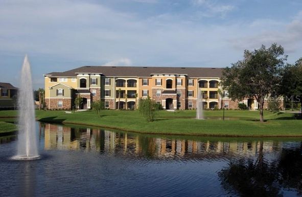 10125 COURTNEY PALMS BOULEVARD UNIT 303