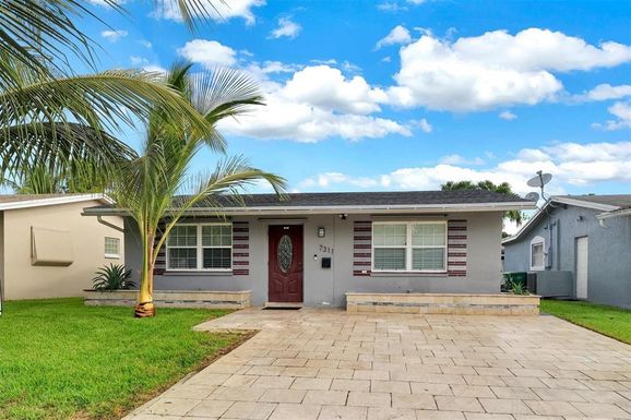 7311 NW 52 COURT