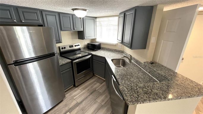 1932 LAKE ATRIUMS CIRCLE UNIT 65