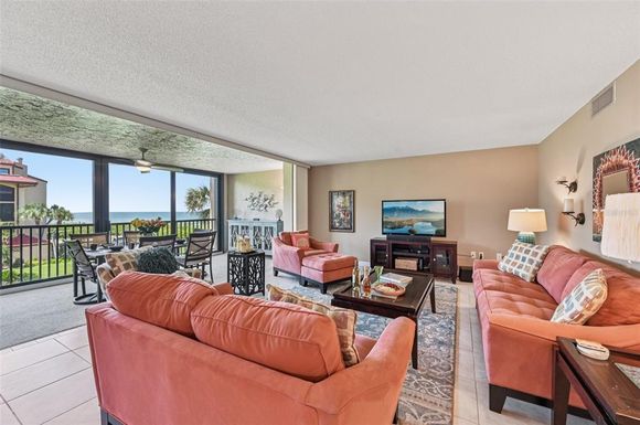 8710 MIDNIGHT PASS ROAD UNIT 203