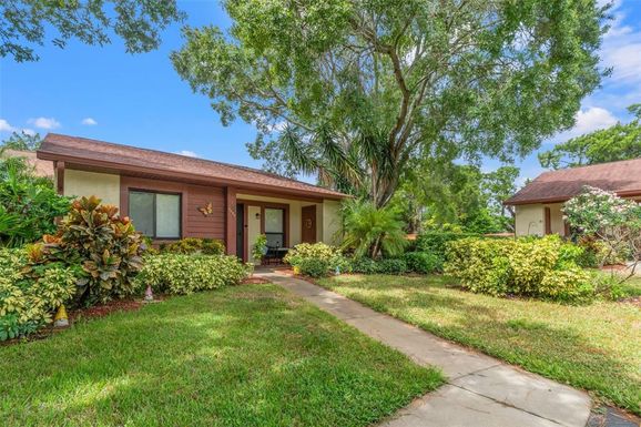 7235 GREYSTONE DRIVE UNIT F