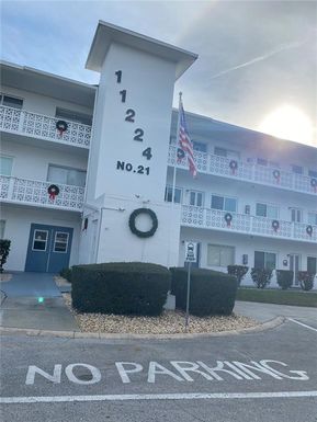 11224 82ND AVENUE UNIT 210