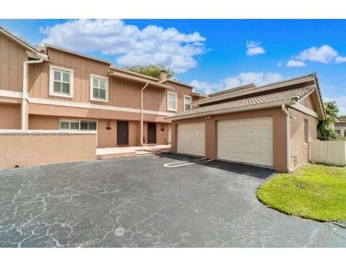 4341 CORAL SPRINGS DRIVE UNIT 1G