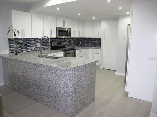 1511 S BAY VILLA PLACE UNIT 1/2