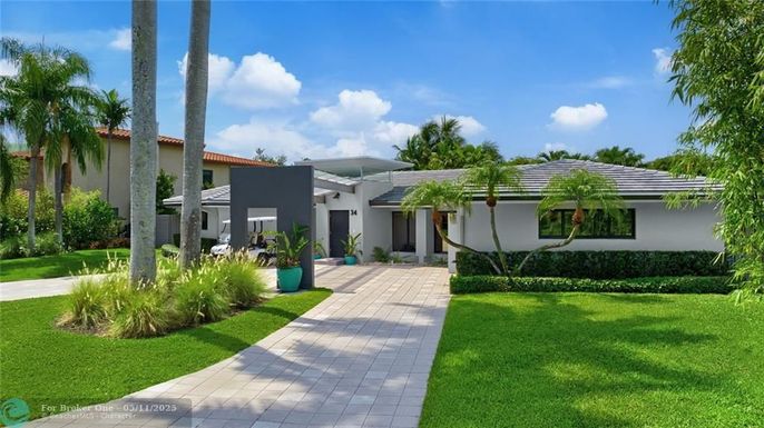 34 Cayuga Rd, Sea Ranch Lakes, FL 33308