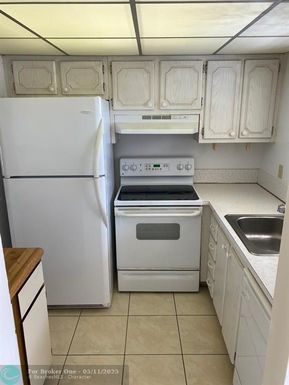 9911 Sandalfoot Blvd, Boca Raton, FL 33428